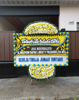 Papan Bunga Duka di Tuguwaji